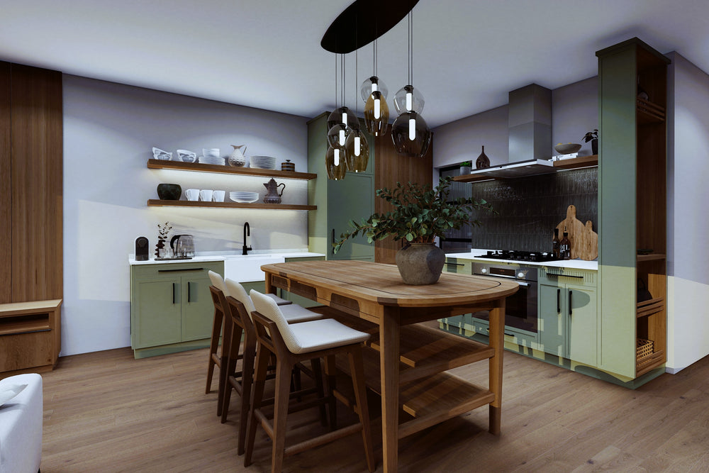 A modern kitchen interior with a wooden dining island, four bar stools, open shelving, sage green cabinets, and pendant lights. The room has light wood flooring and a gray wall.